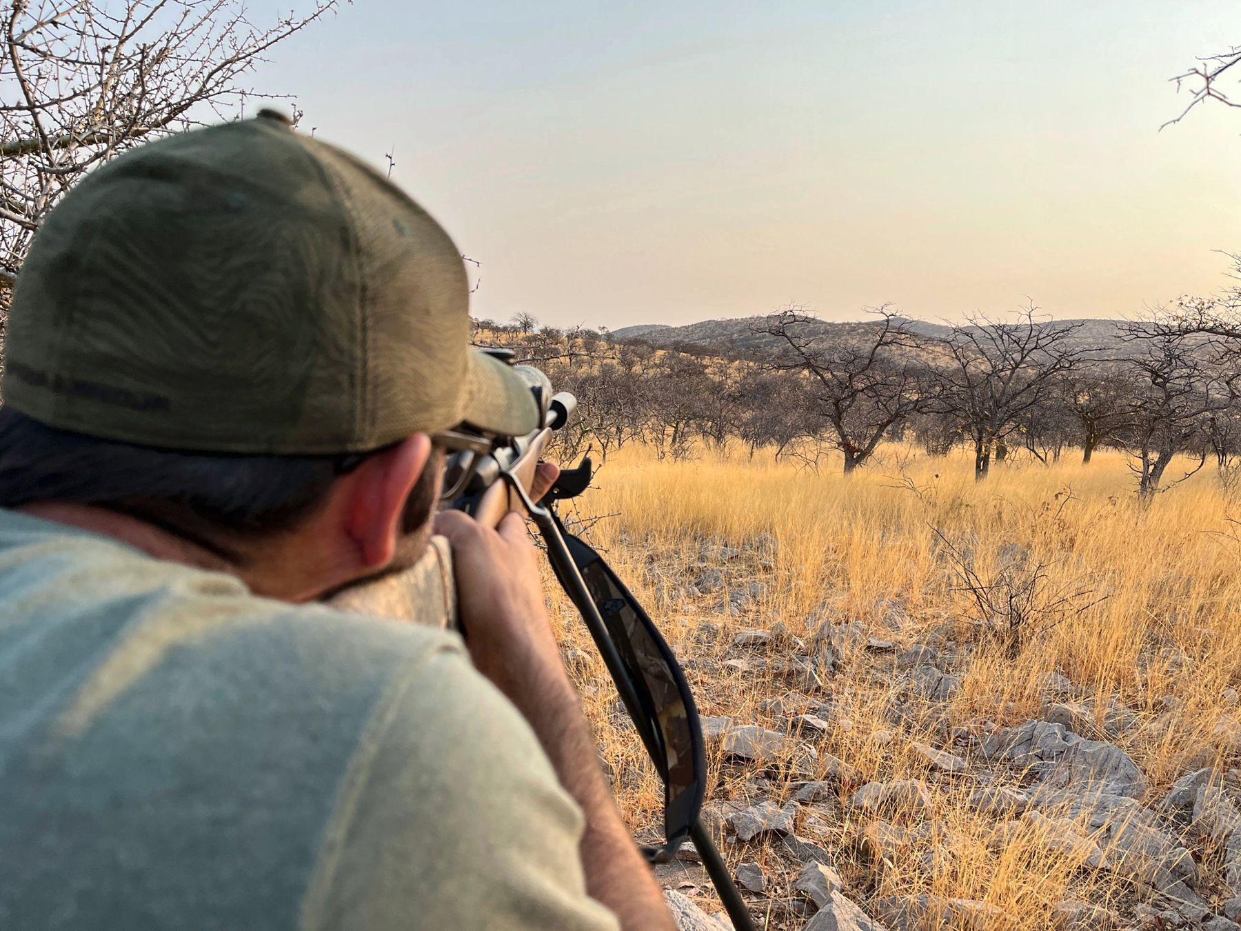 A JSB hunter on the sticks at last light, Namibian bushveld